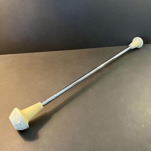 A vintage twirling baton from the mid-20th century. These batons were often used in marching band performances, twirled by majorettes, adding flair and precision to parades and shows