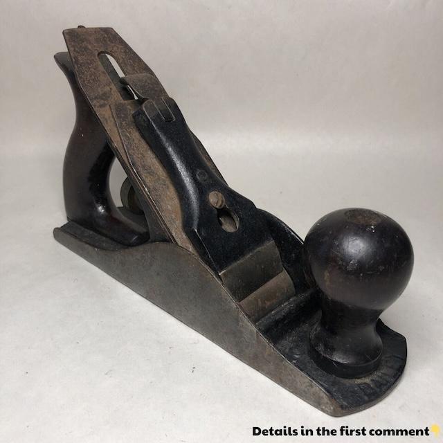 A vintage Stanley Smooth Wood Plane, crafted for precision woodworking, showcasing the timeless design used by artisans to create smooth finishes on wood surfaces